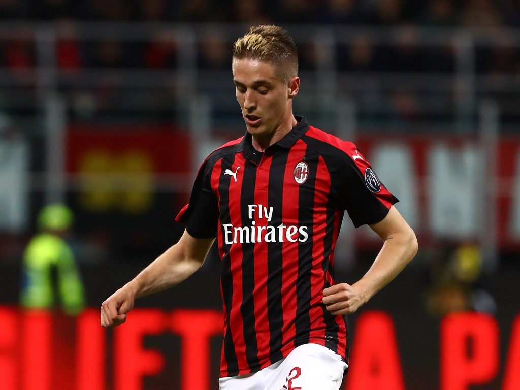 Conti con la maglia rossonera