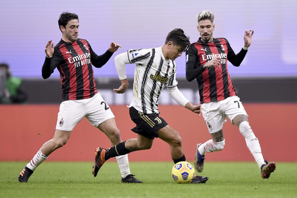 Calabria, adattato a centrocampo, constrasta Dybala