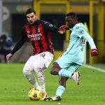 Un contrasto tra Theo Hernandez del Milan e Singo del Torino