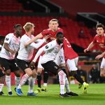 Kjaer e Tomori in stretta marcatura su un attacco del Manchester United